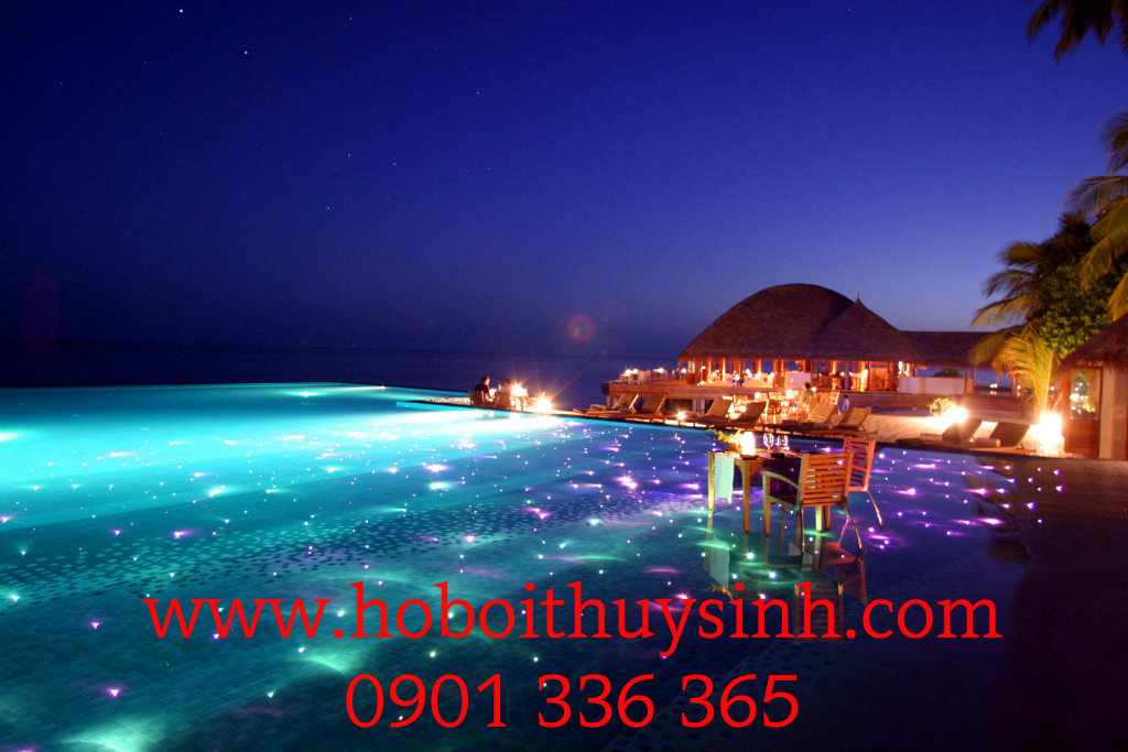 infinity-pool-with-dining-and-led-lights-huvafen-fushi-resort-in-maldives